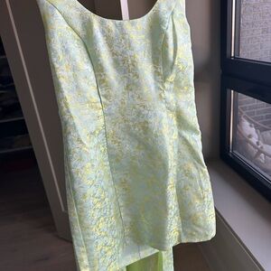 Colorful Anthropologie mini dress with cape